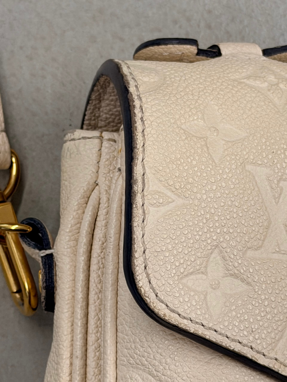 Louis Vuitton Pochette Métis Empreinte Creme