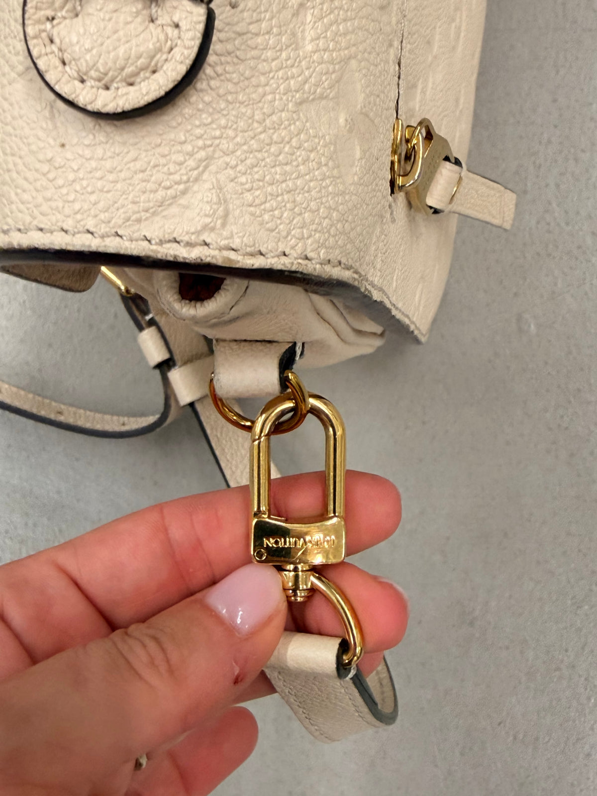 Louis Vuitton Pochette Métis Empreinte Creme