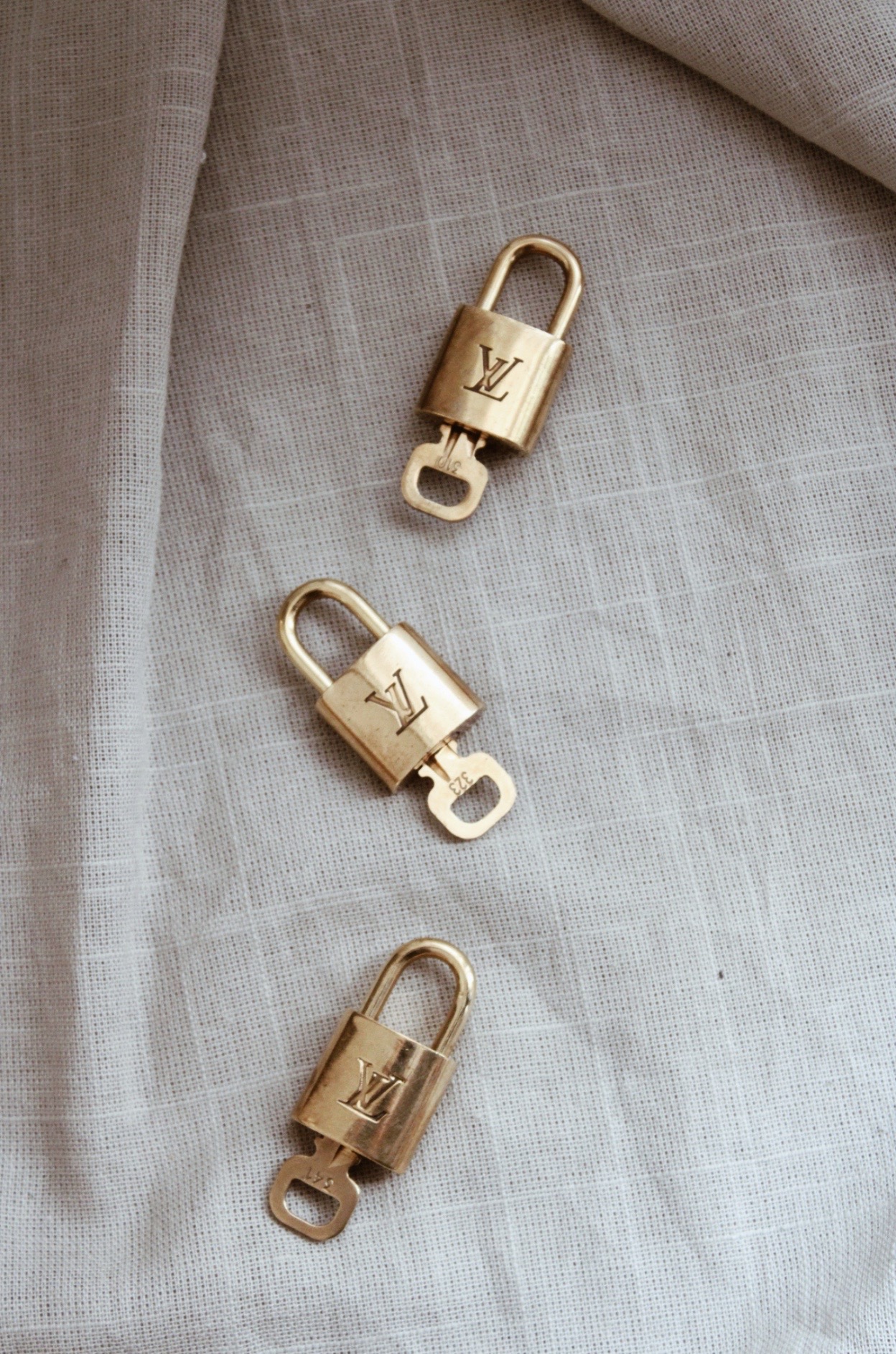 Louis Vuitton Lock With Key - Vintasje