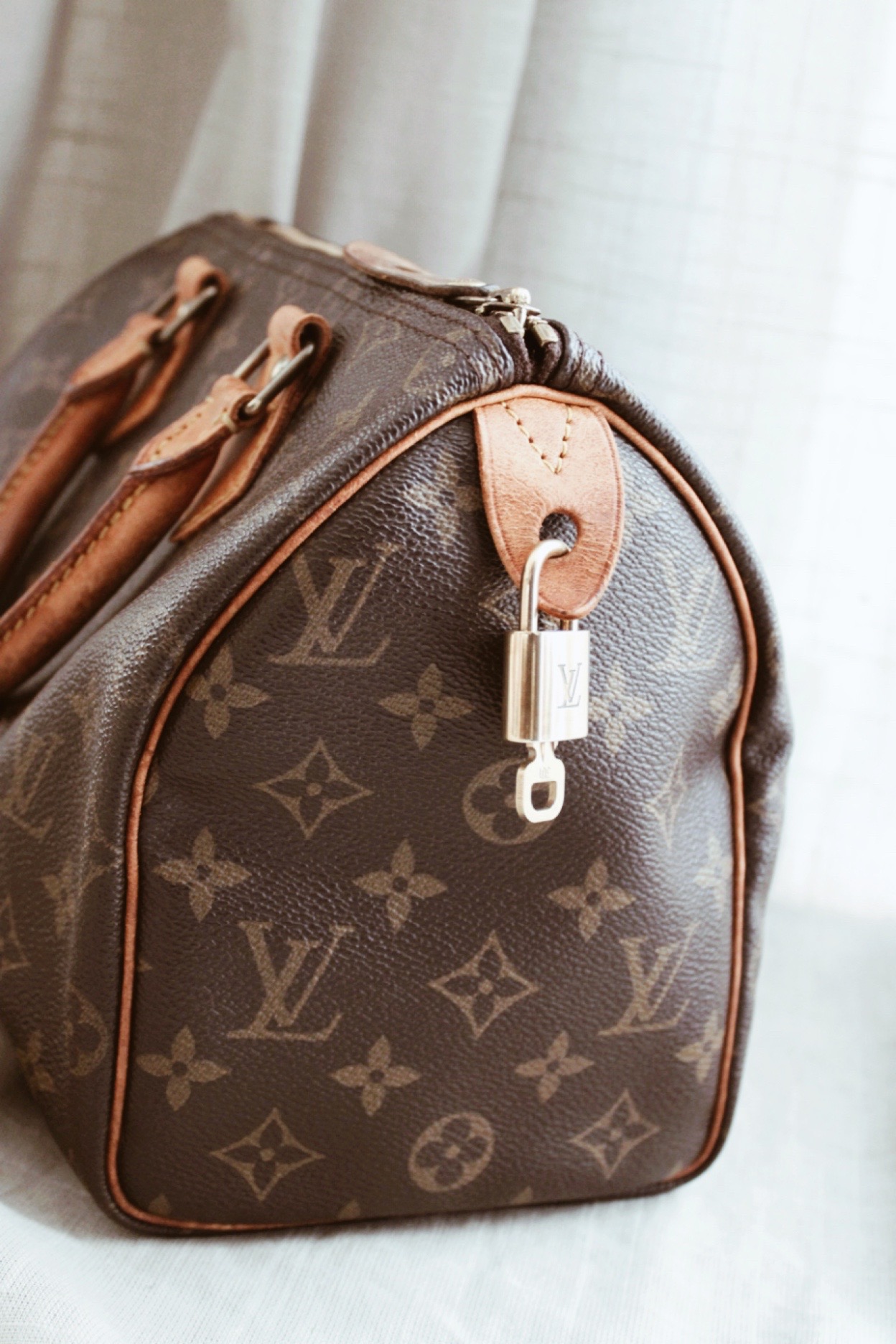 Louis Vuitton Lock With Key - Vintasje